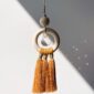 Decoration-triple-pompons-en-macrame-attrape-soleil
